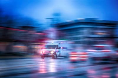An ambulance races to the hospital
